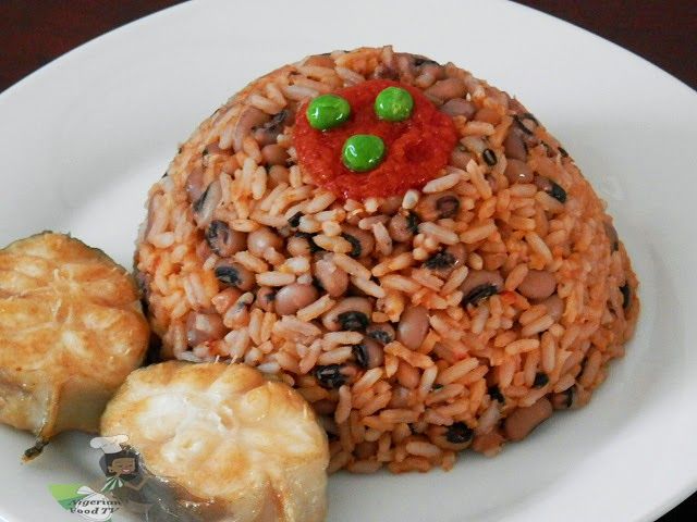 Nigerian rice and beans offer a perfectly balanced meal, combining rich flavors with essential nutrients, making it a family favorite.