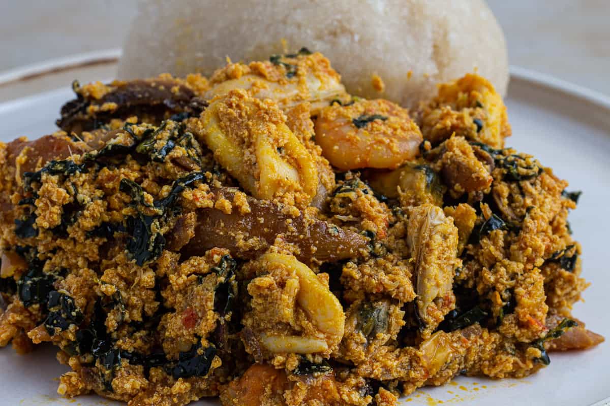 Discover the secret ingredients to the best egusi soup, a flavorful Nigerian dish, made with ground melon seeds and rich spices.