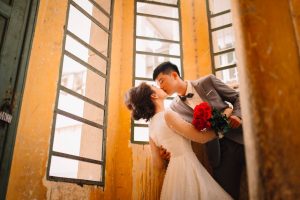 Wedding Couple Kissing in Church